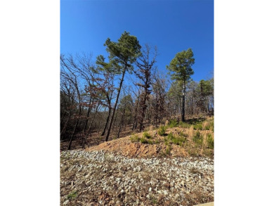 For Sale: A 1.079-acre lot in the desirable Western Hills on Cedar Creek Golf Course At Beavers Bend State Park in Oklahoma - for sale on GolfHomes.com, golf home, golf lot