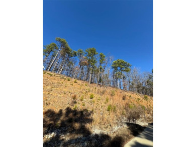 For Sale: A 1.079-acre lot in the desirable Western Hills on Cedar Creek Golf Course At Beavers Bend State Park in Oklahoma - for sale on GolfHomes.com, golf home, golf lot