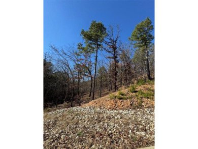 For Sale: A 1.079-acre lot in the desirable Western Hills on Cedar Creek Golf Course At Beavers Bend State Park in Oklahoma - for sale on GolfHomes.com, golf home, golf lot