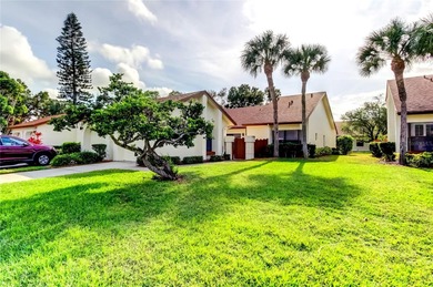 Pride of ownership shines throughout this beautifully maintained on Feather Sound Country Club in Florida - for sale on GolfHomes.com, golf home, golf lot