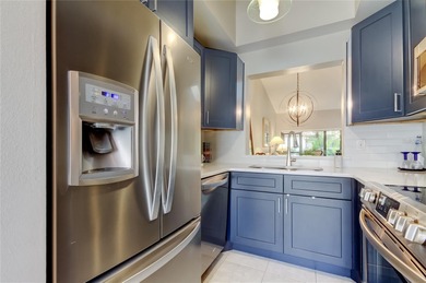 Pride of ownership shines throughout this beautifully maintained on Feather Sound Country Club in Florida - for sale on GolfHomes.com, golf home, golf lot