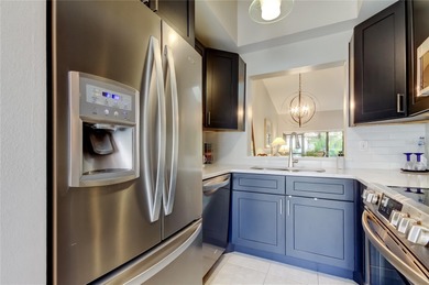 Pride of ownership shines throughout this beautifully maintained on Feather Sound Country Club in Florida - for sale on GolfHomes.com, golf home, golf lot