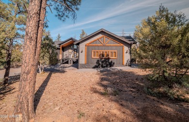 Nestled among the tall pines of the prestigious Torreon Golf on Torreon Golf Club in Arizona - for sale on GolfHomes.com, golf home, golf lot