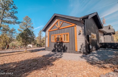 Nestled among the tall pines of the prestigious Torreon Golf on Torreon Golf Club in Arizona - for sale on GolfHomes.com, golf home, golf lot