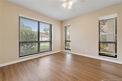 Welcome to this lovely villa set on a peaceful lake in the on Martin Downs Country Club in Florida - for sale on GolfHomes.com, golf home, golf lot