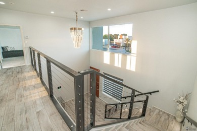 Welcome to this modern contemporary home in the sought-after on Cocopah Rio Colorado Golf Course in Arizona - for sale on GolfHomes.com, golf home, golf lot