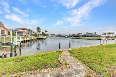 WATERFRONT pool home located in desirable deed restricted BURNT on Twin Isles Country Club in Florida - for sale on GolfHomes.com, golf home, golf lot