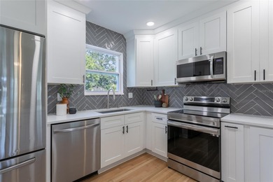 Located in Snell Isle Shores, just steps away from the famous on The Renaisssance Vinoy Golf Club in Florida - for sale on GolfHomes.com, golf home, golf lot