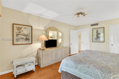 This charming 2-bedroom, 2-bathroom first-floor villa in Port on Port Royal Golf and Racquet Club in South Carolina - for sale on GolfHomes.com, golf home, golf lot