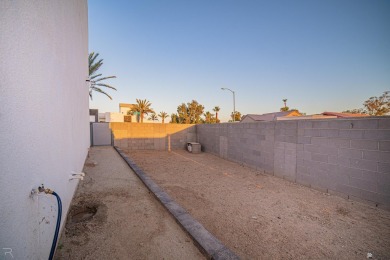 Welcome to this modern contemporary home in the sought-after on Cocopah Rio Colorado Golf Course in Arizona - for sale on GolfHomes.com, golf home, golf lot