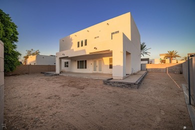 Welcome to this modern contemporary home in the sought-after on Cocopah Rio Colorado Golf Course in Arizona - for sale on GolfHomes.com, golf home, golf lot