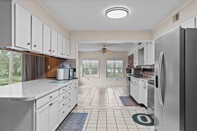 Enjoy golf course living at its finest! This spacious 4-bedroom on Goshen Plantation Golf Club in Georgia - for sale on GolfHomes.com, golf home, golf lot