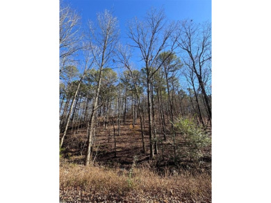 For Sale: A 1.016-acre lot in the desirable Western Hills on Cedar Creek Golf Course At Beavers Bend State Park in Oklahoma - for sale on GolfHomes.com, golf home, golf lot