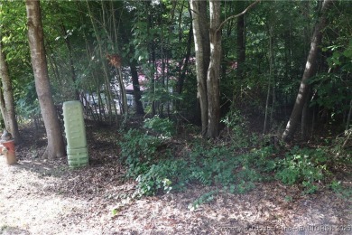 Experience the best of Carolina Trace living! This wooded corner on Carolina Trace Country Club in North Carolina - for sale on GolfHomes.com, golf home, golf lot