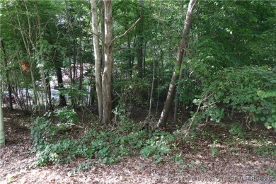 Experience the best of Carolina Trace living! This wooded corner on Carolina Trace Country Club in North Carolina - for sale on GolfHomes.com, golf home, golf lot