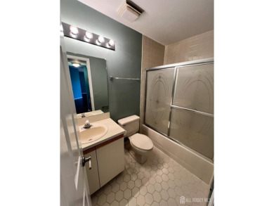 Welcome to this beautiful 2-bedroom, 2 full bath ground floor on Concordia Golf Club in New Jersey - for sale on GolfHomes.com, golf home, golf lot