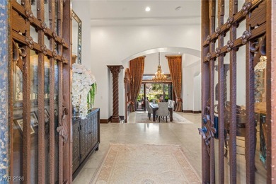 Timeless single-story custom estate with basement, offering 7 on Dragon Ridge Country Club in Nevada - for sale on GolfHomes.com, golf home, golf lot