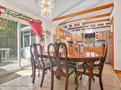 This stunning 3 bedroom 2 ful bath contemporary home W/ LOW on Pocono Farms Country Club in Pennsylvania - for sale on GolfHomes.com, golf home, golf lot