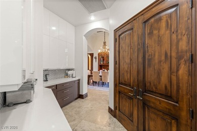 Timeless single-story custom estate with basement, offering 7 on Dragon Ridge Country Club in Nevada - for sale on GolfHomes.com, golf home, golf lot