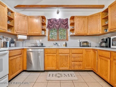 This stunning 3 bedroom 2 ful bath contemporary home W/ LOW on Pocono Farms Country Club in Pennsylvania - for sale on GolfHomes.com, golf home, golf lot