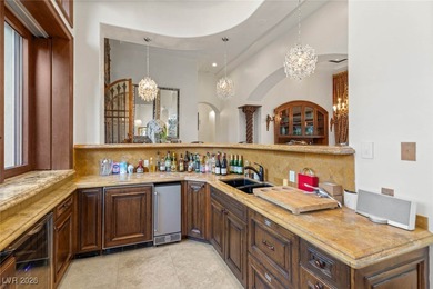 Timeless single-story custom estate with basement, offering 7 on Dragon Ridge Country Club in Nevada - for sale on GolfHomes.com, golf home, golf lot