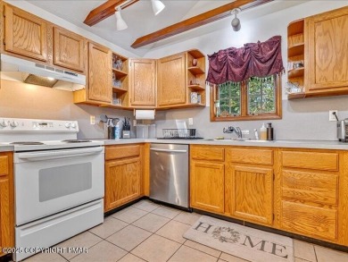 This stunning 3 bedroom 2 ful bath contemporary home W/ LOW on Pocono Farms Country Club in Pennsylvania - for sale on GolfHomes.com, golf home, golf lot