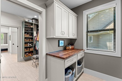 All brick custom home built in 2024 offers easy living one-level on Tellico Village -The Links At Kahite Golf Course in Tennessee - for sale on GolfHomes.com, golf home, golf lot