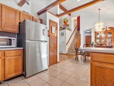 This stunning 3 bedroom 2 ful bath contemporary home W/ LOW on Pocono Farms Country Club in Pennsylvania - for sale on GolfHomes.com, golf home, golf lot