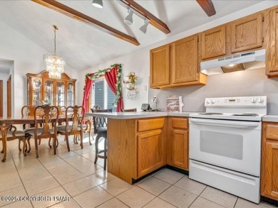 This stunning 3 bedroom 2 ful bath contemporary home W/ LOW on Pocono Farms Country Club in Pennsylvania - for sale on GolfHomes.com, golf home, golf lot