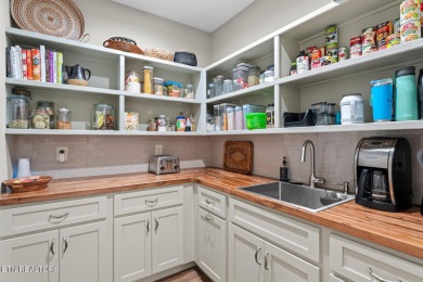 All brick custom home built in 2024 offers easy living one-level on Tellico Village -The Links At Kahite Golf Course in Tennessee - for sale on GolfHomes.com, golf home, golf lot