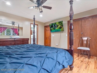 This stunning 3 bedroom 2 ful bath contemporary home W/ LOW on Pocono Farms Country Club in Pennsylvania - for sale on GolfHomes.com, golf home, golf lot