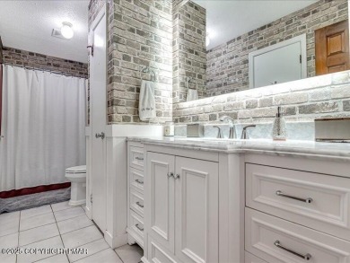 This stunning 3 bedroom 2 ful bath contemporary home W/ LOW on Pocono Farms Country Club in Pennsylvania - for sale on GolfHomes.com, golf home, golf lot