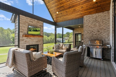 All brick custom home built in 2024 offers easy living one-level on Tellico Village -The Links At Kahite Golf Course in Tennessee - for sale on GolfHomes.com, golf home, golf lot
