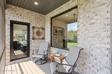 All brick custom home built in 2024 offers easy living one-level on Tellico Village -The Links At Kahite Golf Course in Tennessee - for sale on GolfHomes.com, golf home, golf lot