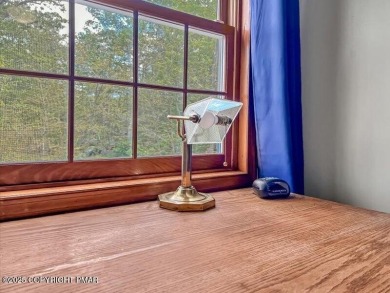 This stunning 3 bedroom 2 ful bath contemporary home W/ LOW on Pocono Farms Country Club in Pennsylvania - for sale on GolfHomes.com, golf home, golf lot