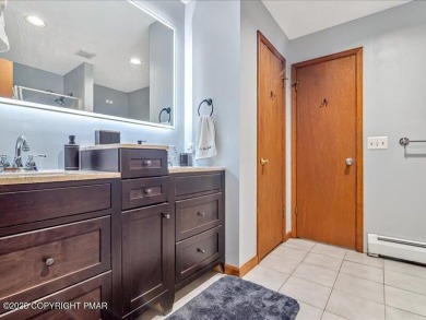This stunning 3 bedroom 2 ful bath contemporary home W/ LOW on Pocono Farms Country Club in Pennsylvania - for sale on GolfHomes.com, golf home, golf lot