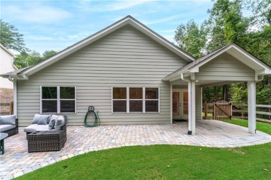 Welcome home to the amazing community of Lake Arrowhead. Nestled on The Highlands Course at Lake Arrowhead in Georgia - for sale on GolfHomes.com, golf home, golf lot