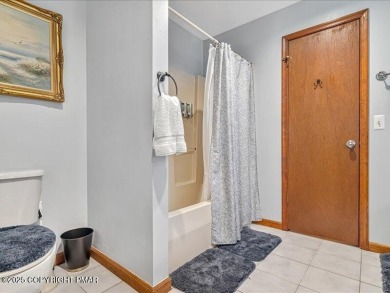 This stunning 3 bedroom 2 ful bath contemporary home W/ LOW on Pocono Farms Country Club in Pennsylvania - for sale on GolfHomes.com, golf home, golf lot
