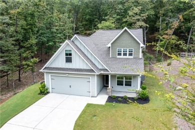 Welcome home to the amazing community of Lake Arrowhead. Nestled on The Highlands Course at Lake Arrowhead in Georgia - for sale on GolfHomes.com, golf home, golf lot