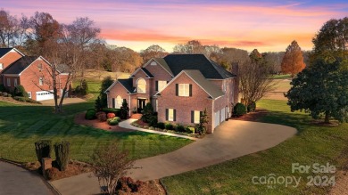 Live all on one level if desired. This home overlooks the 17th on Rock Barn Golf and Spa in North Carolina - for sale on GolfHomes.com, golf home, golf lot