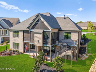 All brick custom home built in 2024 offers easy living one-level on Tellico Village -The Links At Kahite Golf Course in Tennessee - for sale on GolfHomes.com, golf home, golf lot