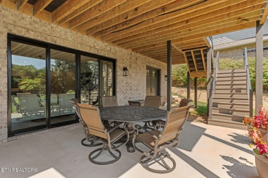 All brick custom home built in 2024 offers easy living one-level on Tellico Village -The Links At Kahite Golf Course in Tennessee - for sale on GolfHomes.com, golf home, golf lot