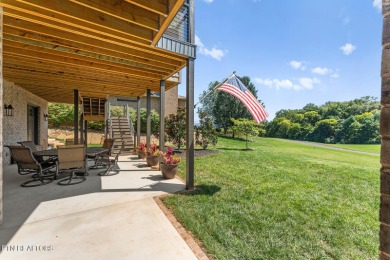 All brick custom home built in 2024 offers easy living one-level on Tellico Village -The Links At Kahite Golf Course in Tennessee - for sale on GolfHomes.com, golf home, golf lot