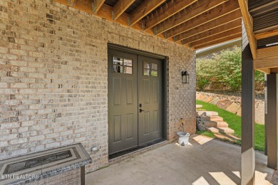 All brick custom home built in 2024 offers easy living one-level on Tellico Village -The Links At Kahite Golf Course in Tennessee - for sale on GolfHomes.com, golf home, golf lot