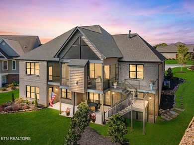 All brick custom home built in 2024 offers easy living one-level on Tellico Village -The Links At Kahite Golf Course in Tennessee - for sale on GolfHomes.com, golf home, golf lot