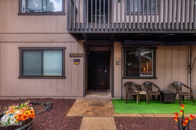 Tucked into the heart of Pinetop's beloved Sports Village, this on Pinetop Lakes Golf and Country Club in Arizona - for sale on GolfHomes.com, golf home, golf lot