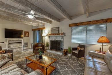 Tucked into the heart of Pinetop's beloved Sports Village, this on Pinetop Lakes Golf and Country Club in Arizona - for sale on GolfHomes.com, golf home, golf lot