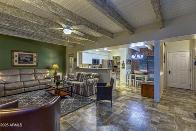 Tucked into the heart of Pinetop's beloved Sports Village, this on Pinetop Lakes Golf and Country Club in Arizona - for sale on GolfHomes.com, golf home, golf lot