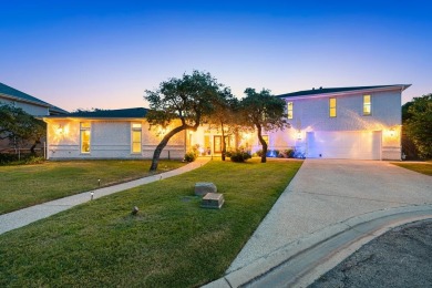 Welcome to 2110 Harbor Ct, a custom waterfront retreat located on Rockport Country Club in Texas - for sale on GolfHomes.com, golf home, golf lot
