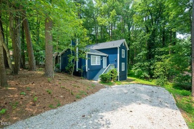 Beautifully updated 4-bedroom, 2-bath home in the highly on Twin Lakes Golf Course in North Carolina - for sale on GolfHomes.com, golf home, golf lot